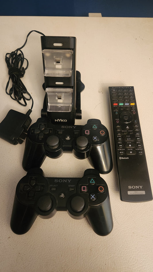 Set of 2 PS3 Controllers, Charger and Remote